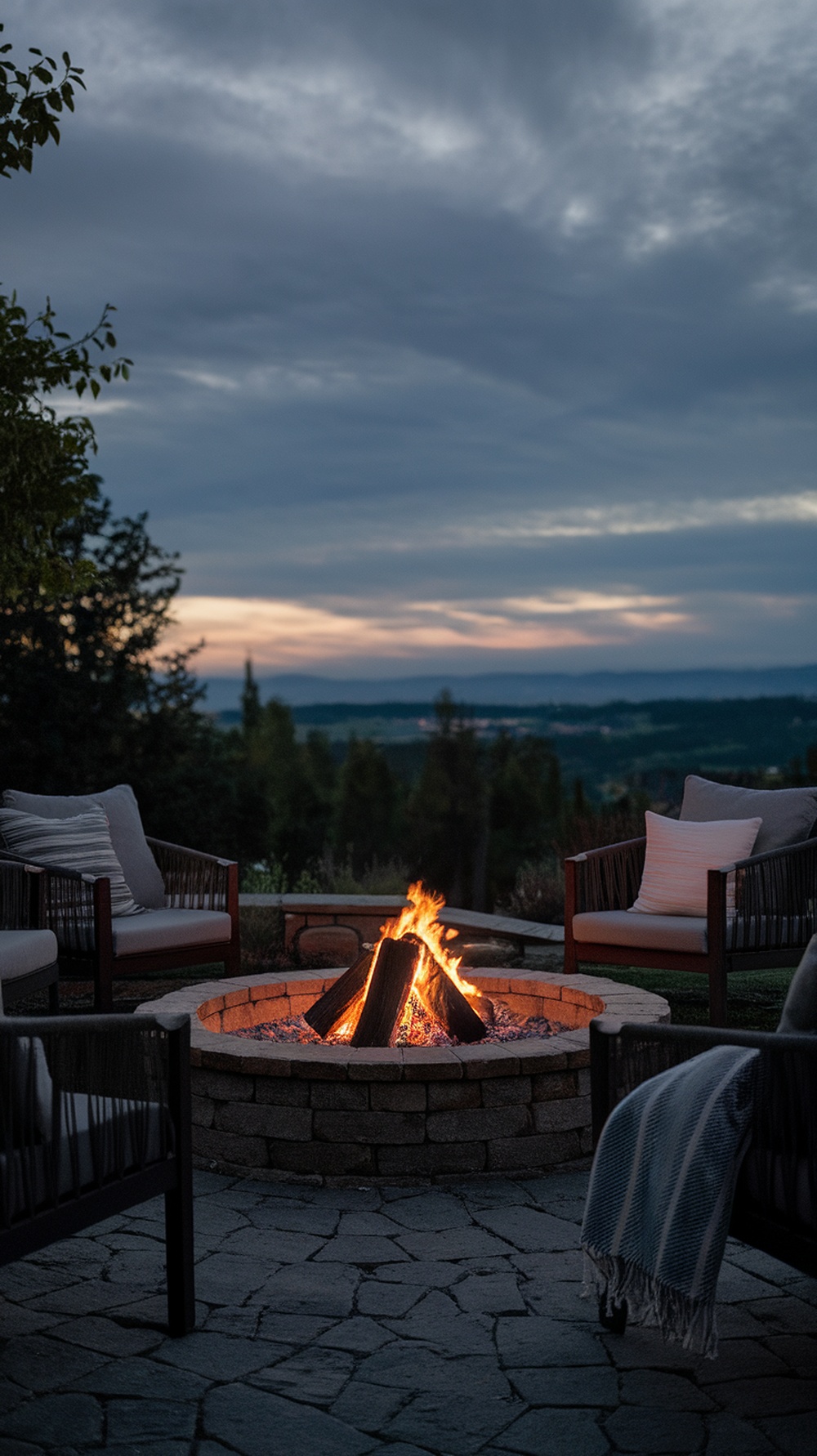 Cozy fire pit area with comfortable seating and a view.